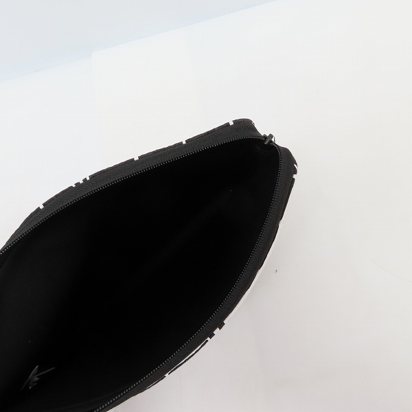 実際に弊社で買取させて頂いた【未使用】MARC BY MARC JACOBS/マークバイマークジェイコブス クラッチバッグ/タブレットケース M0001929/M6131024 2点セットの画像 3枚目