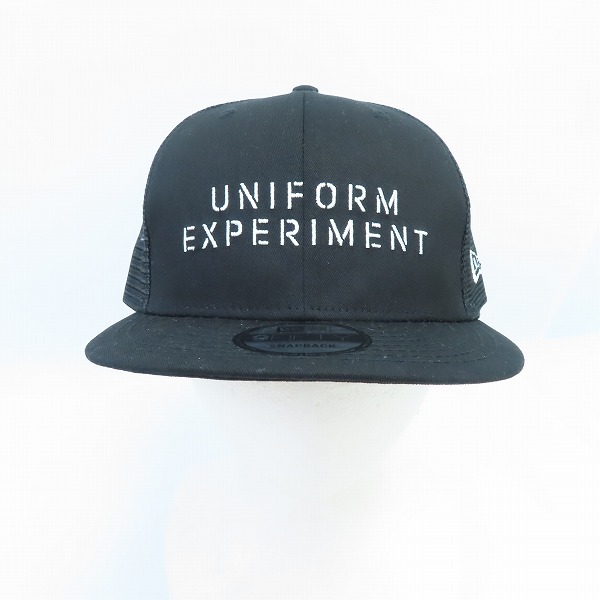 実際に弊社で買取させて頂いた【未使用】uniform experiment×NEW ERA/ユニフォームエクスペリメント×ニューエラ LOGO 9FIFTY SNAP BACK CAP