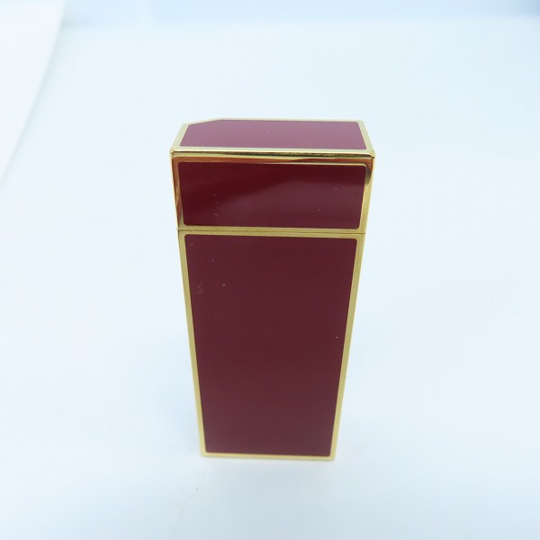 実際に弊社で買取させて頂いたCartier/カルティエ ガスライター レッド×ゴールドの画像 1枚目