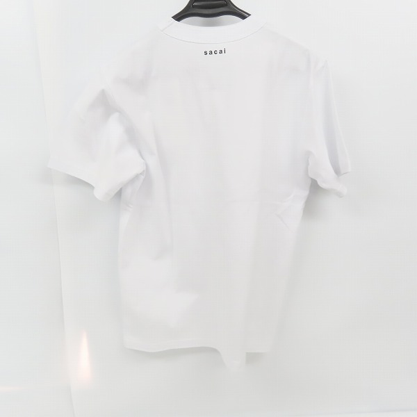 実際に弊社で買取させて頂いた【未使用】Sacai × KAWS/サカイ × カウズ 21AW Flock Print T-Shirt/半袖Tシャツ 白 21-0288S/3の画像 1枚目