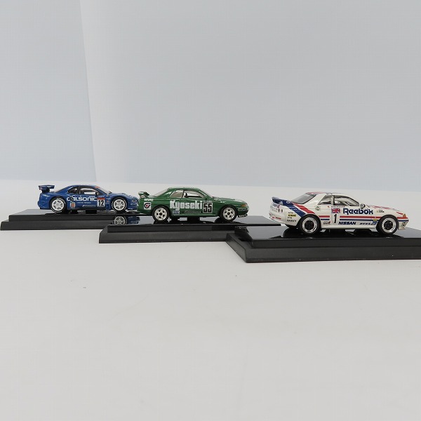 実際に弊社で買取させて頂いたKyosho/京商 1/64 REEBOK/NIKKO KYOSEKI/CALSONIC SKYLINE GP-1PLUS 1990/1993/2003 ミニカー 3点セットの画像 3枚目