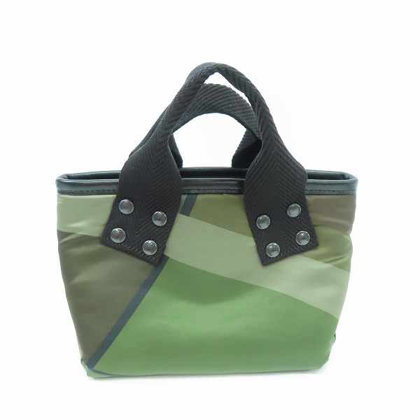 実際に弊社で買取させて頂いたsacai×KAWS/サカイ×カウズ Tote トート バッグ 鞄 CAMOUFLAGE/カモ 21-0256Sの画像 1枚目