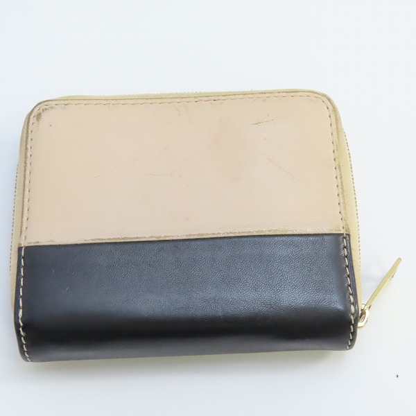 実際に弊社で買取させて頂いたCELINE/セリーヌ ラウンドジップウォレット/財布 バイカラーの画像 1枚目