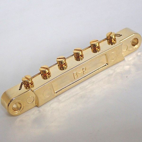 実際に弊社で買取させて頂いたEpiphone/エピフォン Korina Flying-V搭載ブリッジ B-2 ゴールドパーツの画像 4枚目