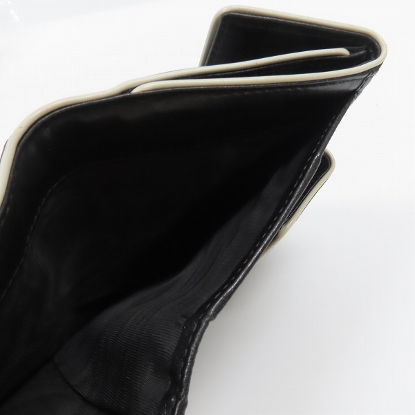 実際に弊社で買取させて頂いたPRADA/プラダ 2つ折り財布/ブラックの画像 5枚目