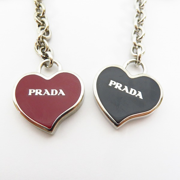 実際に弊社で買取させて頂いたPRADA/プラダ ハートチャーム ストラップ 2点セットの画像 1枚目