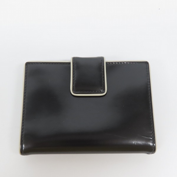 実際に弊社で買取させて頂いたPRADA/プラダ 2つ折り財布/ブラックの画像 1枚目