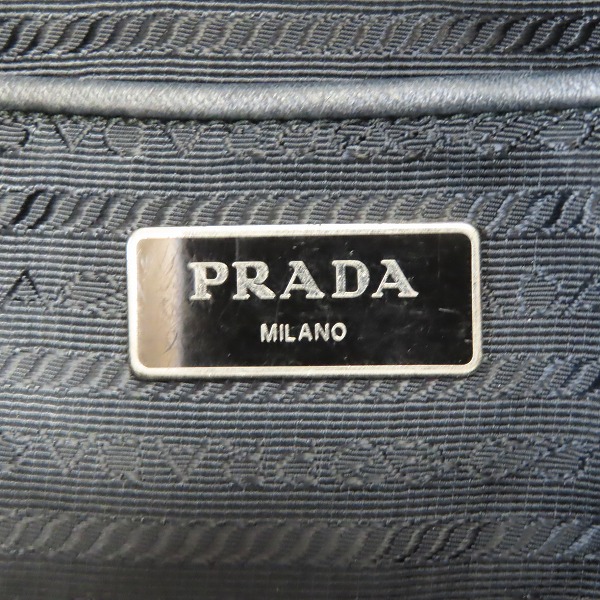実際に弊社で買取させて頂いた【難有り】PRADA/プラダ TESSUTO STAMPAT ピストル総柄 三角ロゴプレートトートバッグ B4696Pの画像 4枚目