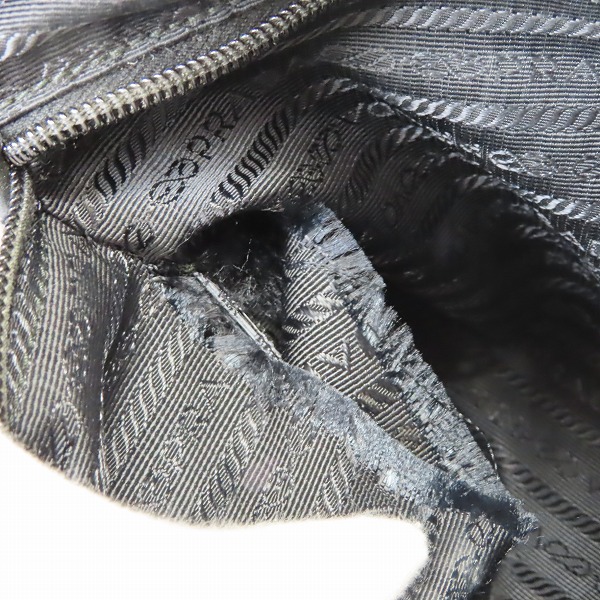 実際に弊社で買取させて頂いた【難有り】PRADA/プラダ TESSUTO STAMPAT ピストル総柄 三角ロゴプレートトートバッグ B4696Pの画像 7枚目