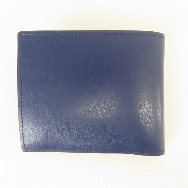 実際に弊社で買取させて頂いたPaulSmith/ポールスミス 二つ折り財布 ネイビーの画像 1枚目