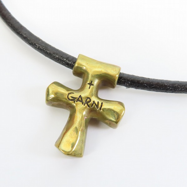 実際に弊社で買取させて頂いたGARNI/ガルニ レザーコード付き クロスネックレスの画像 1枚目
