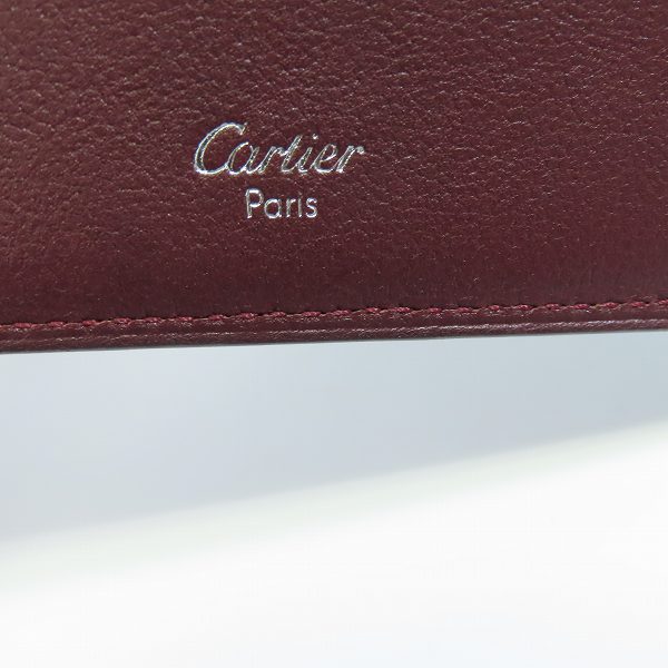 実際に弊社で買取させて頂いた【ギャラ付き】CARTIER/カルティエ カボション レザー二つ折り財布 L3000575の画像 4枚目