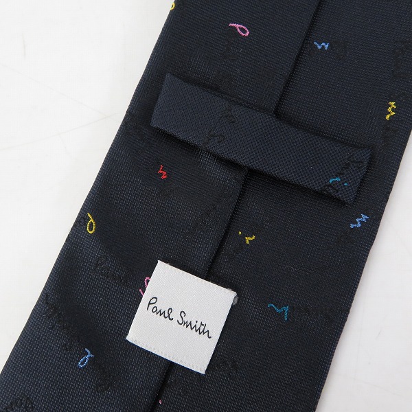 実際に弊社で買取させて頂いたPaul Smith/ポールスミス ポップスペルロゴ総柄 シルクネクタイ 110057 552MIの画像 1枚目