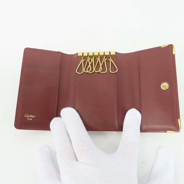 実際に弊社で買取させて頂いたCartier/カルティエ マストライン レザー 6連キーケース ボルドーの画像 4枚目