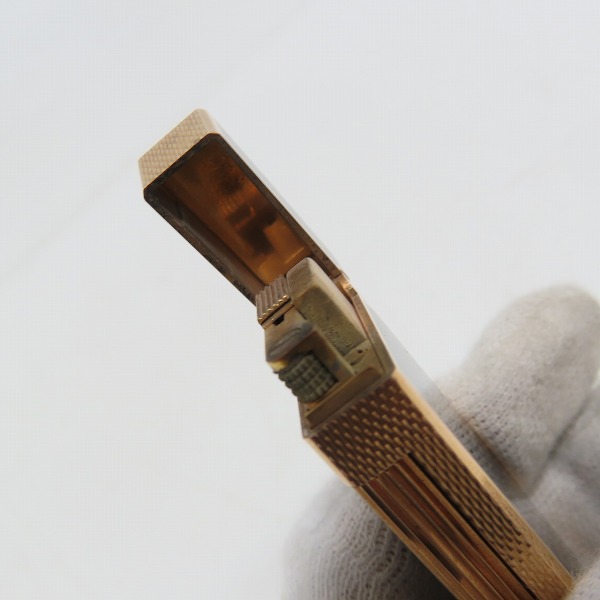 実際に弊社で買取させて頂いたdunhill/ダンヒル サイドローラーガスライター ブラック × ゴールド 箔散らしデザインの画像 6枚目