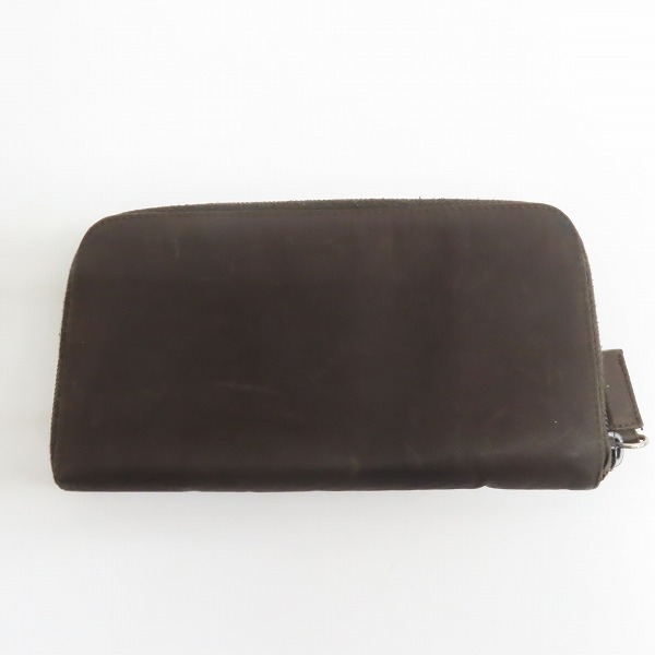 実際に弊社で買取させて頂いたPRADA/プラダ 三角ロゴプレート ラウンドファスナー長財布の画像 1枚目