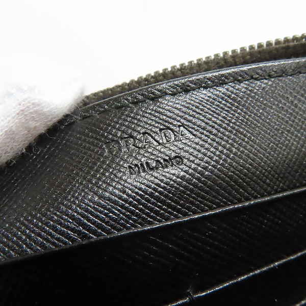 実際に弊社で買取させて頂いたPRADA/プラダ 三角ロゴプレート ラウンドファスナー長財布の画像 4枚目