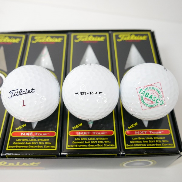 実際に弊社で買取させて頂いた【未使用/オウンネーム】Titleist/タイトリスト NXT TOUR ゴルフボール 3ダースの画像 1枚目