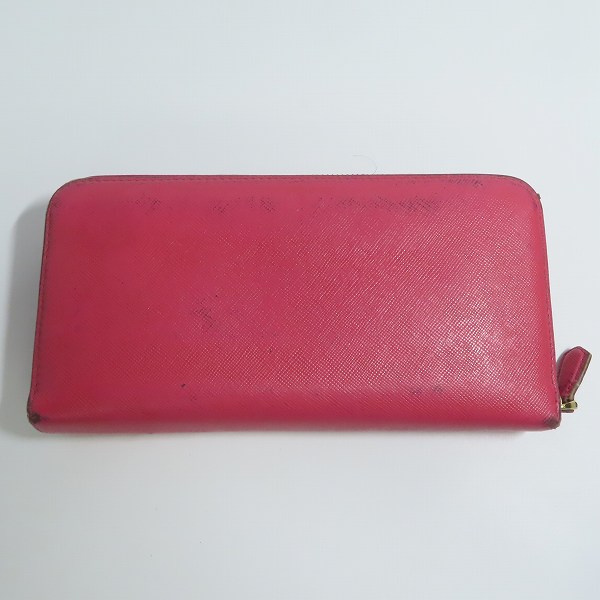 実際に弊社で買取させて頂いたPRADA/プラダ ラウンドジップ 長財布/ロングウォレットの画像 1枚目