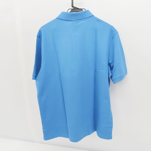 実際に弊社で買取させて頂いた(2)【未使用】LACOSTE/ラコステ メタルバッジプレーンポロシャツ ブルー PH9161L/Lの画像 1枚目