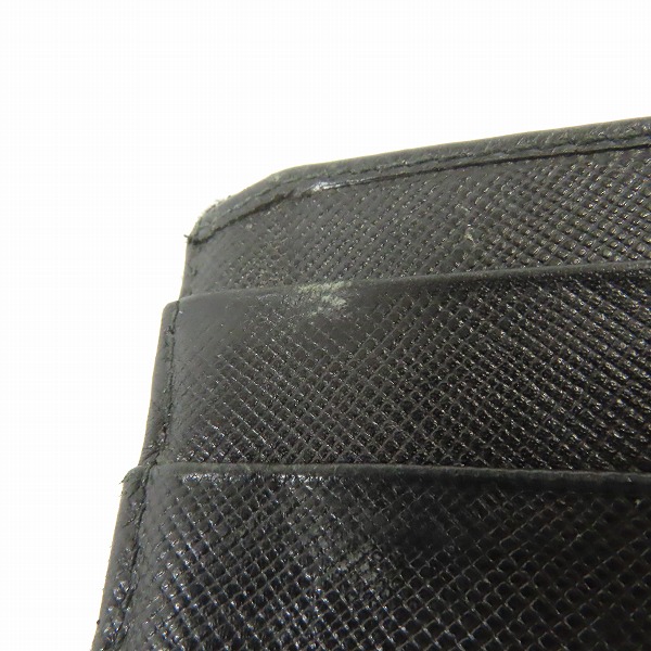 実際に弊社で買取させて頂いた【難あり】PRADA/プラダ サフィアーノ レザー 二つ折りコンパクトウォレット/財布の画像 6枚目