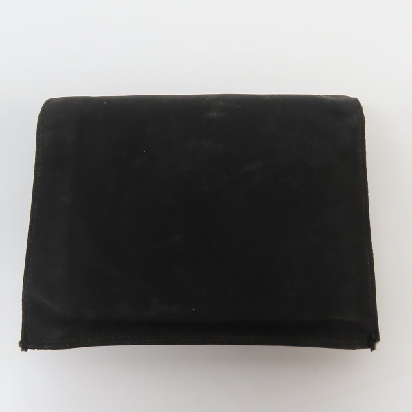 実際に弊社で買取させて頂いた【難あり】PRADA/プラダ サフィアーノ レザー 二つ折りコンパクトウォレット/財布の画像 1枚目