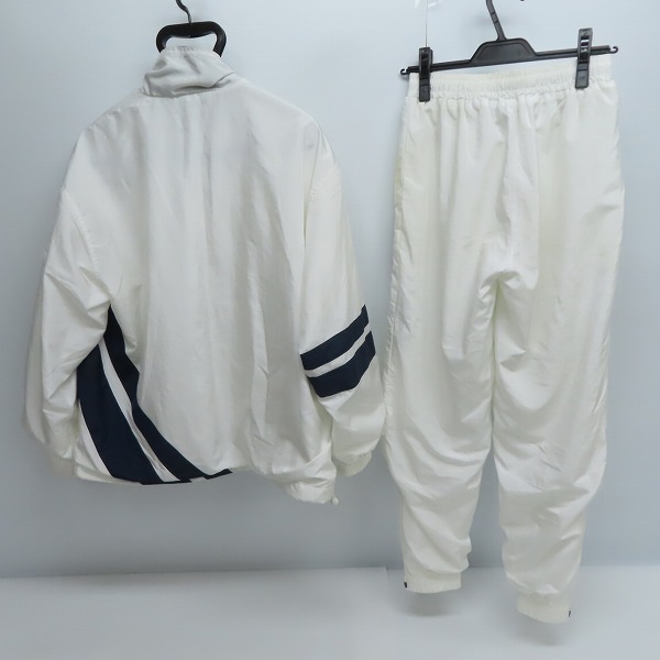 実際に弊社で買取させて頂いたFILA/フィラ SPORTS INTERNATIONAL ハーフジップジャケット/パンツ セットアップ Sの画像 1枚目