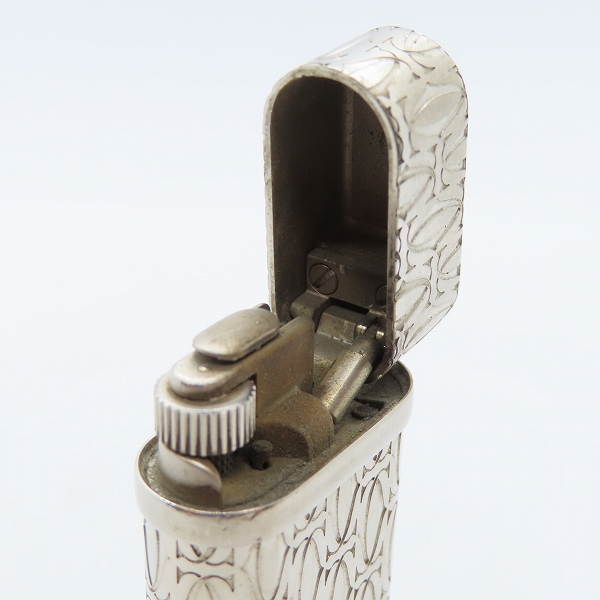 実際に弊社で買取させて頂いたCartier/カルティエ シルバー 総柄 ガスライターの画像 4枚目