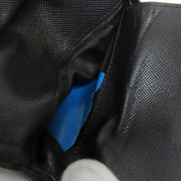 実際に弊社で買取させて頂いた【難あり】PRADA/プラダ サフィアーノ レザー 二つ折りコンパクトウォレット/財布の画像 9枚目