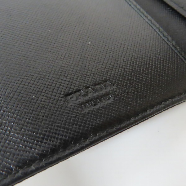 実際に弊社で買取させて頂いた【難あり】PRADA/プラダ サフィアーノ レザー 二つ折りコンパクトウォレット/財布の画像 4枚目