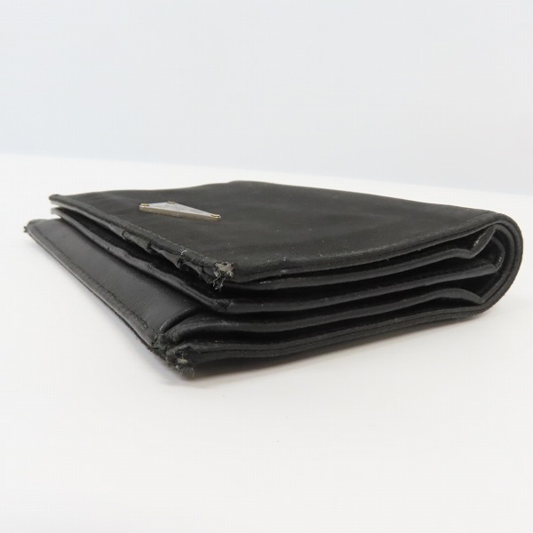 実際に弊社で買取させて頂いた【難あり】PRADA/プラダ サフィアーノ レザー 二つ折りコンパクトウォレット/財布の画像 2枚目