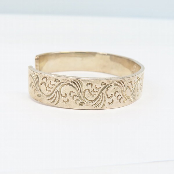 実際に弊社で買取させて頂いた【ギャラ付】FIRST ARROWS/ファーストアローズ K18付 平打12mm カラ草彫りバングル BR-026の画像 4枚目