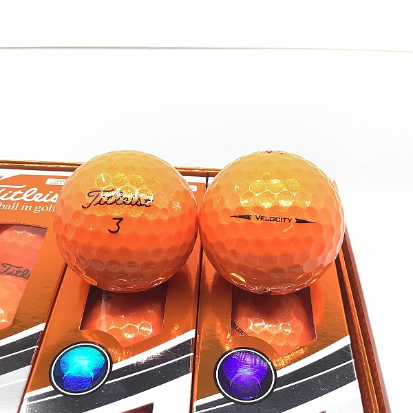 実際に弊社で買取させて頂いた【未使用】Titleist/タイトリスト VELOCITY オレンジ ゴルフボール 1ダースの画像 1枚目