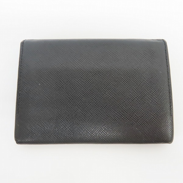 実際に弊社で買取させて頂いたBURBERRY/バーバリー 裏地 ノバチェック 二つ折り財布の画像 1枚目