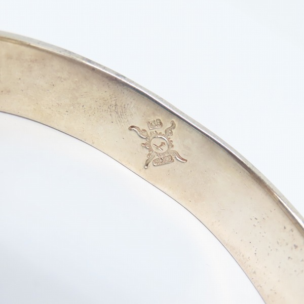 実際に弊社で買取させて頂いた【ギャラ付】FIRST ARROWS/ファーストアローズ K18付 平打12mm カラ草彫りバングル BR-026の画像 6枚目