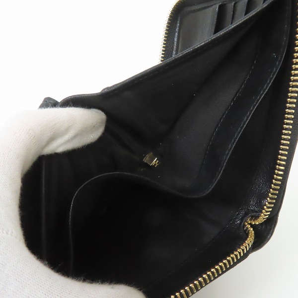 実際に弊社で買取させて頂いたJIMMY CHOO/ジミーチュウ スタッズ ラウンドジップ 二つ折り 財布/ウォレット の画像 4枚目