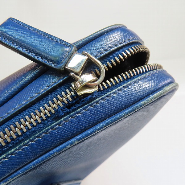 実際に弊社で買取させて頂いた【難有り】PRADA/プラダ サフィアーノ トライアングルロゴ ブリーフケースの画像 9枚目
