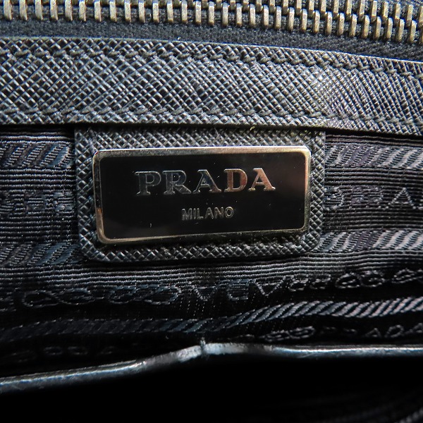実際に弊社で買取させて頂いた【難有り】PRADA/プラダ サフィアーノ トライアングルロゴ ブリーフケースの画像 5枚目