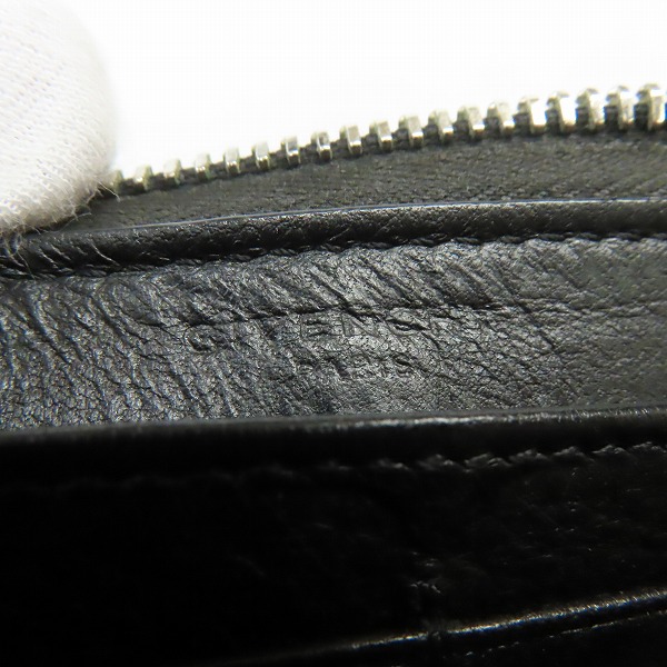 実際に弊社で買取させて頂いたGIVENCHY/ジバンシィ クロス装飾 長財布 レザー ラウンドジップの画像 4枚目