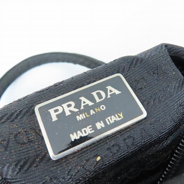 実際に弊社で買取させて頂いた【難有り】PRADA/プラダ 三角 ロゴプレート ナイロン ハンドバッグの画像 4枚目