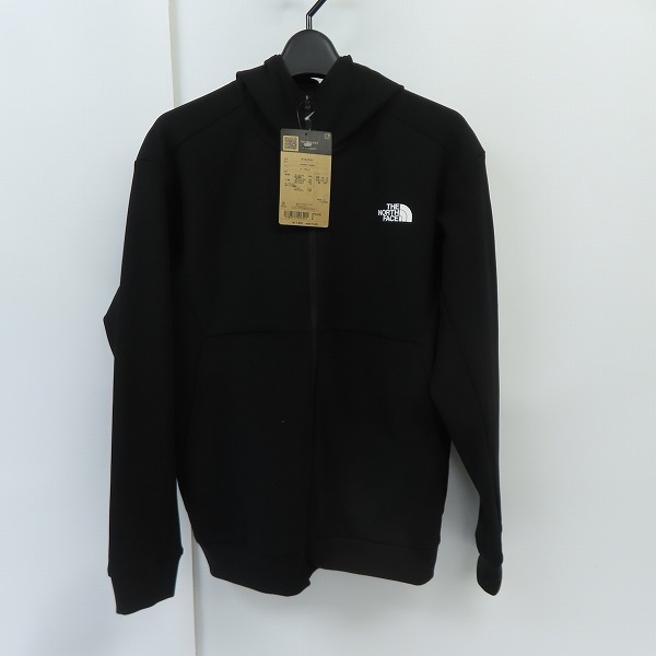 実際に弊社で買取させて頂いた【未使用】THE NORTH FACE/ノースフェイス AMBITION HOODIE/アンビション フーディー 黒  NT62290/Mの画像 0枚目