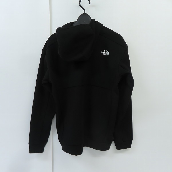 実際に弊社で買取させて頂いた【未使用】THE NORTH FACE/ノースフェイス AMBITION HOODIE/アンビション フーディー 黒  NT62290/Mの画像 1枚目