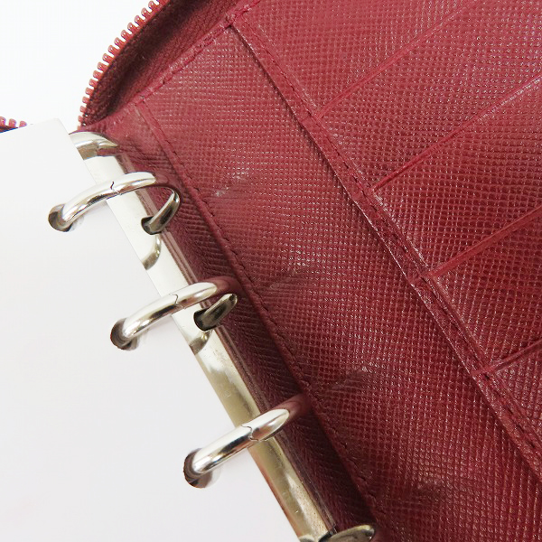 実際に弊社で買取させて頂いたPRADA/プラダ サフィアーノレザー ラウンドファスナー 手帳カバーの画像 5枚目