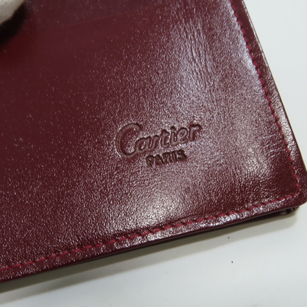 実際に弊社で買取させて頂いたCartier/カルティエ マストライン レザー 二つ折り カードケース/パスケースの画像 5枚目