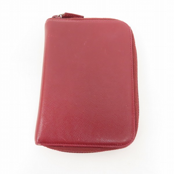 実際に弊社で買取させて頂いたPRADA/プラダ サフィアーノレザー ラウンドファスナー 手帳カバーの画像 1枚目