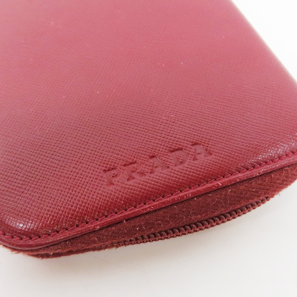 実際に弊社で買取させて頂いたPRADA/プラダ サフィアーノレザー ラウンドファスナー 手帳カバーの画像 6枚目
