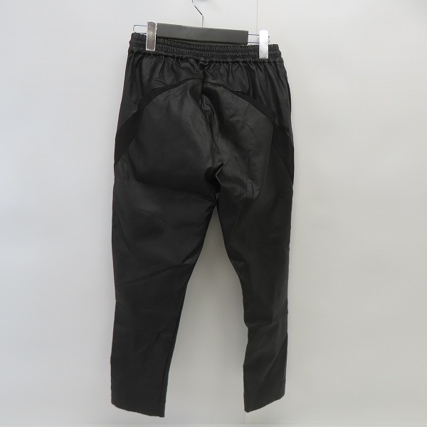 実際に弊社で買取させて頂いたNO ID. BLACK/ノーアイディーブラック コーティング ストレッチ トラックパンツ 448006-663P/1の画像 1枚目