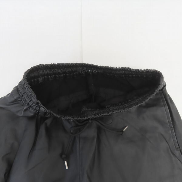 実際に弊社で買取させて頂いたNO ID. BLACK/ノーアイディーブラック コーティング ストレッチ トラックパンツ 448006-663P/1の画像 2枚目
