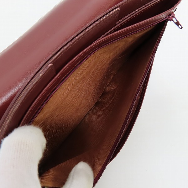 実際に弊社で買取させて頂いたCartier/カルティエ マストライン レザー 二つ折り長財布/クラッチバッグの画像 7枚目