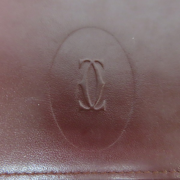 実際に弊社で買取させて頂いたCartier/カルティエ マストライン レザー 二つ折り長財布/クラッチバッグの画像 3枚目